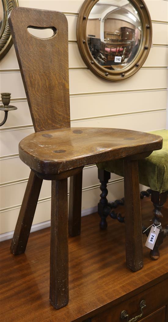 A pair of oak high back stools